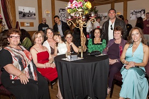 Women celebrating an event in formal attire